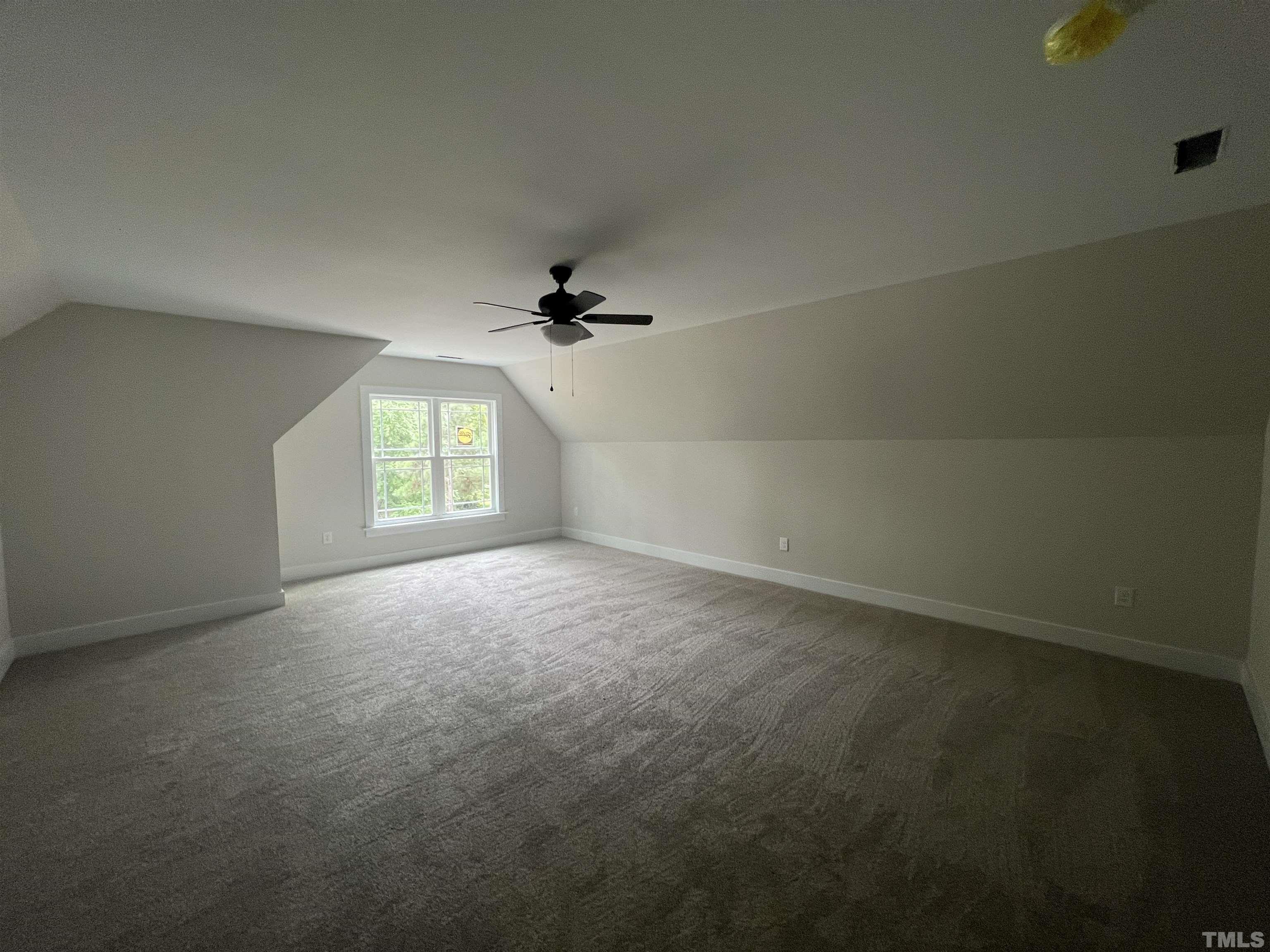 1108 Hammerman Drive Willow Spring, NC 27592 - Photo 16 of 22 an empty room with a empty space and windows