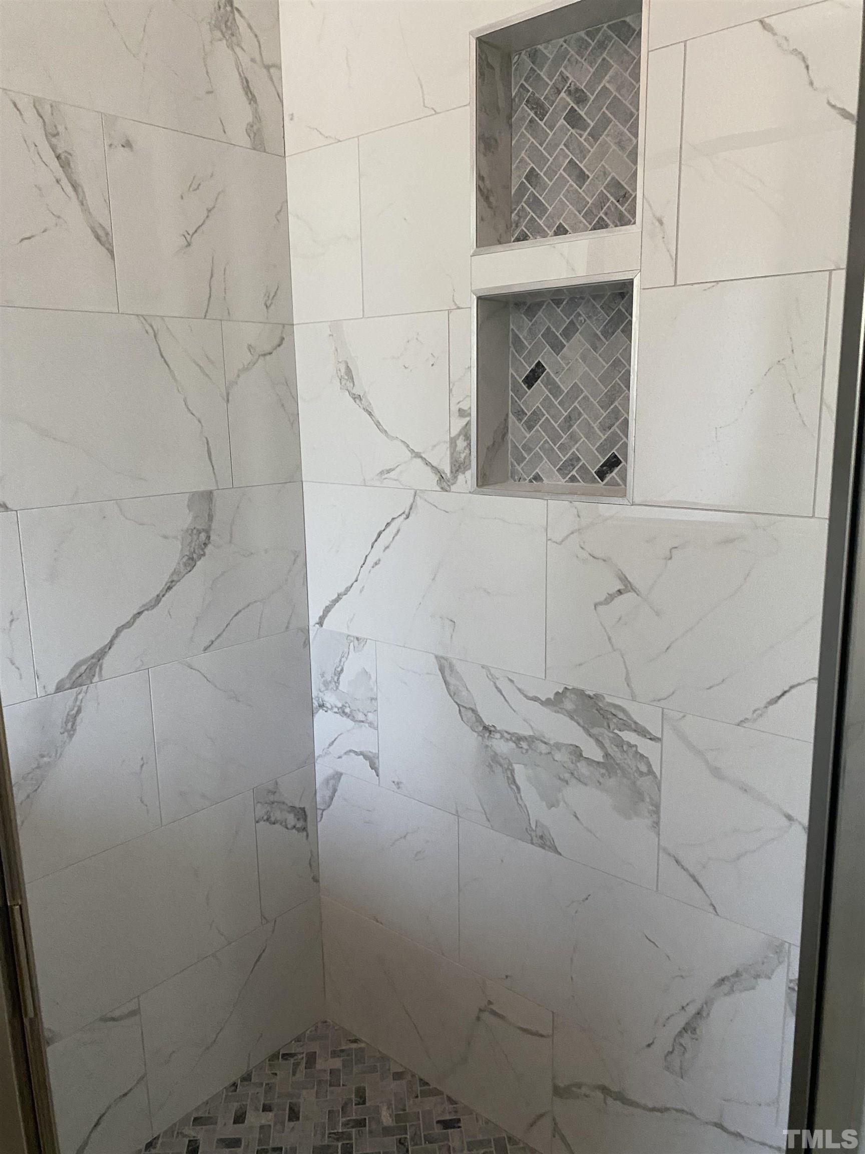 1108 Hammerman Drive Willow Spring, NC 27592 - Photo 8 of 22 a bathroom with a shower