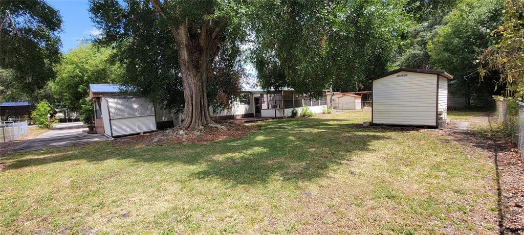 100 Pine Drive Kenansville, FL 34739 - Photo 31 of 34 a garden view with a fountain