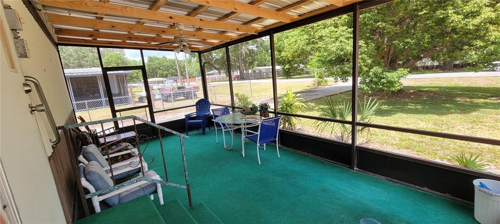 100 Pine Drive Kenansville, FL 34739 - Photo 8 of 34 a view of swimming pool with outdoor seating