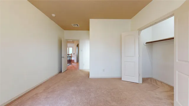 an empty room with entrance and door