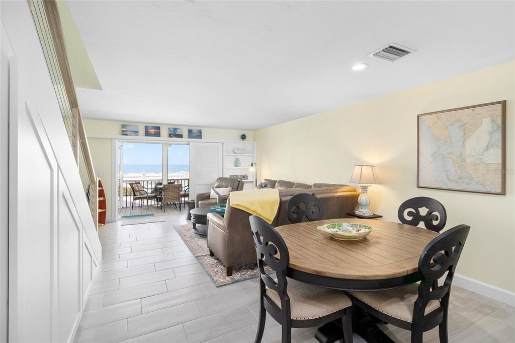 460-5 Gulf Boulevard, Unit 4 Boca Grande, FL 33921 - Photo 8 of 26 a view of a dining room and livingroom