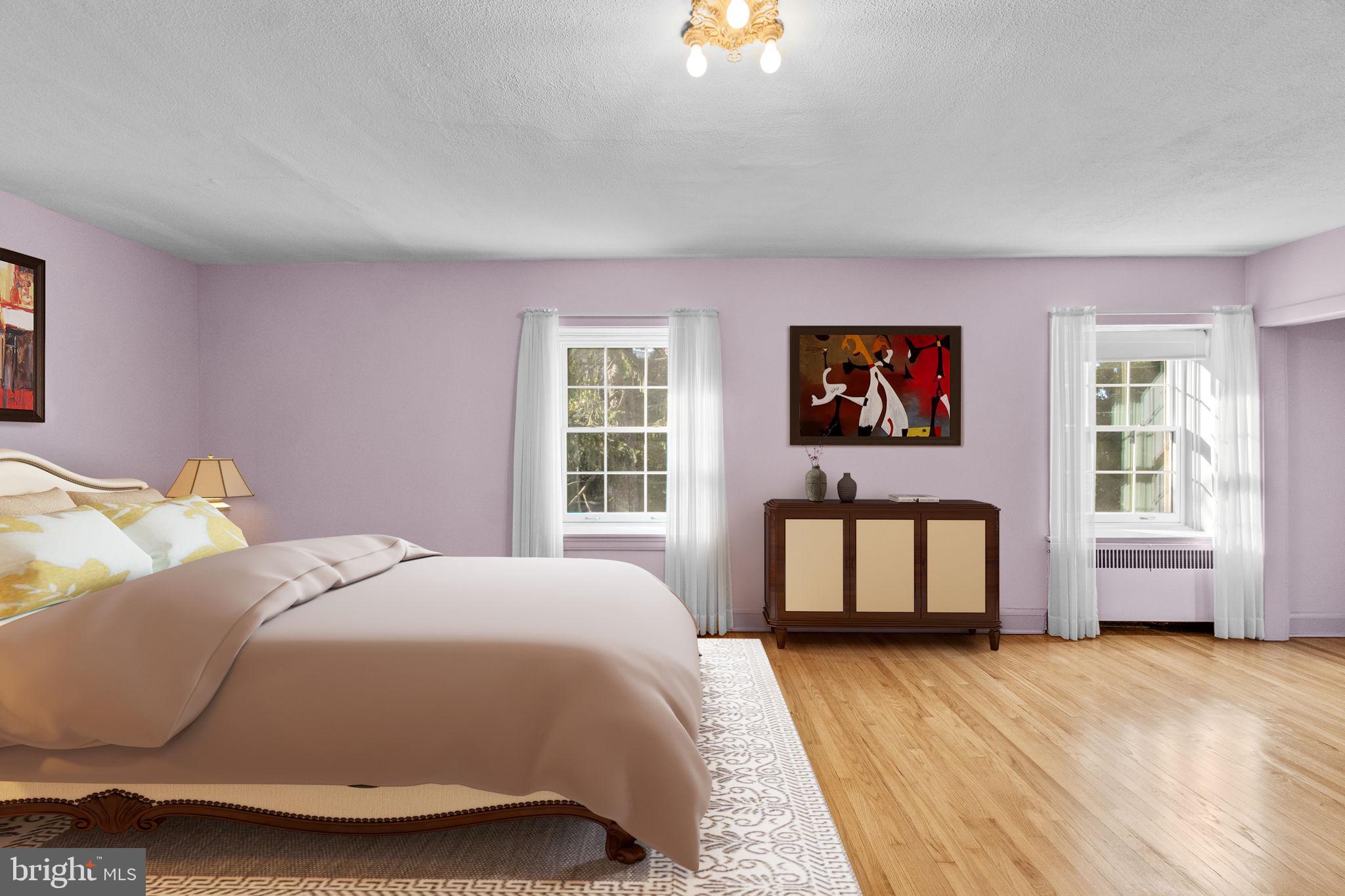 3 Center Road Baltimore, MD 21286 - Photo 12 of 57 a spacious bedroom with a bed and window