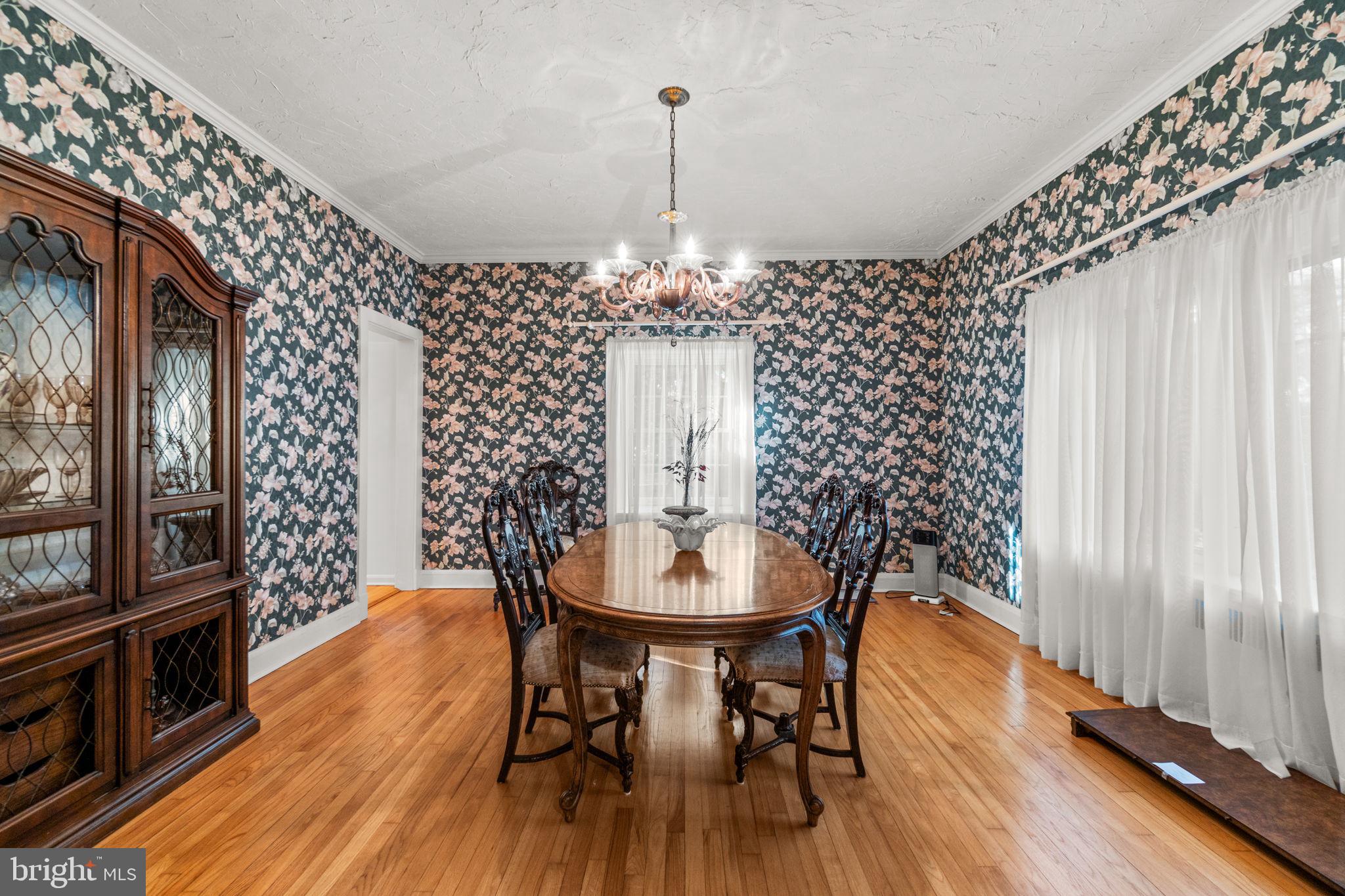 3 Center Road Baltimore, MD 21286 - Photo 17 of 57 a view of a dining room with furniture window and wooden floor