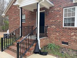a view of a wooden door and a window