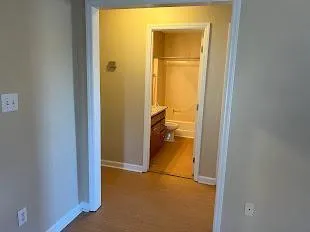 a view of a bathroom from a hallway