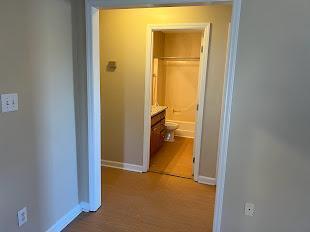 106 Bald Drive Clayton, NC 27520 - Photo 2 of 37 a view of a bathroom from a hallway