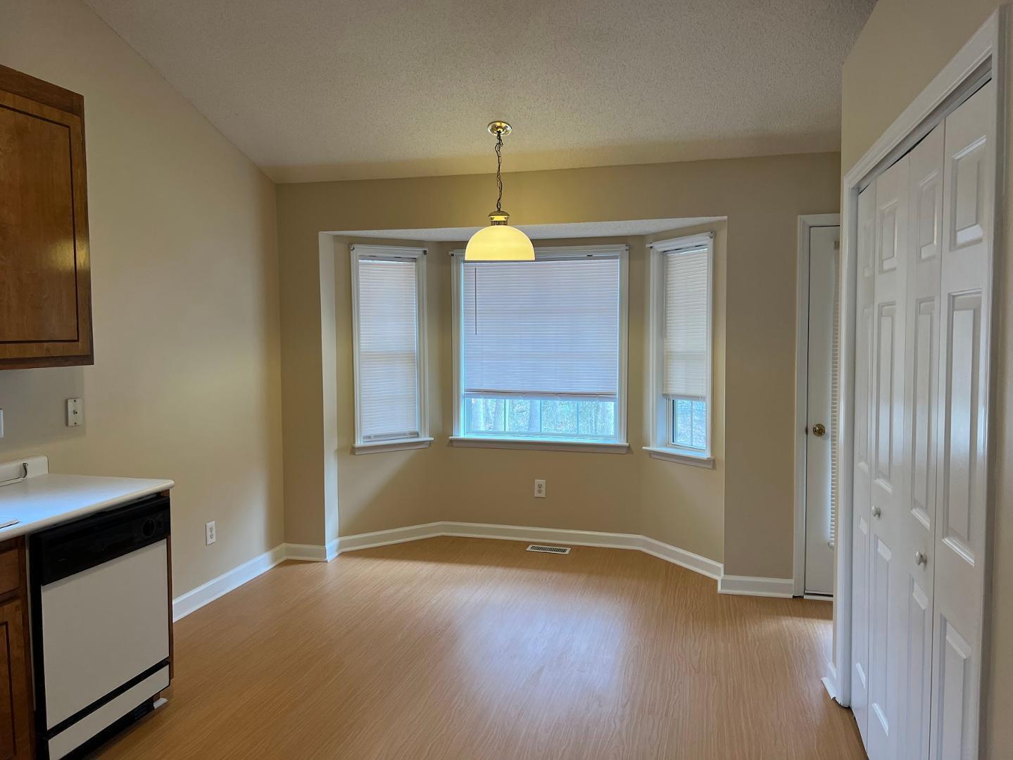 106 Bald Drive Clayton, NC 27520 - Photo 27 of 37 a room with a window and wooden floor