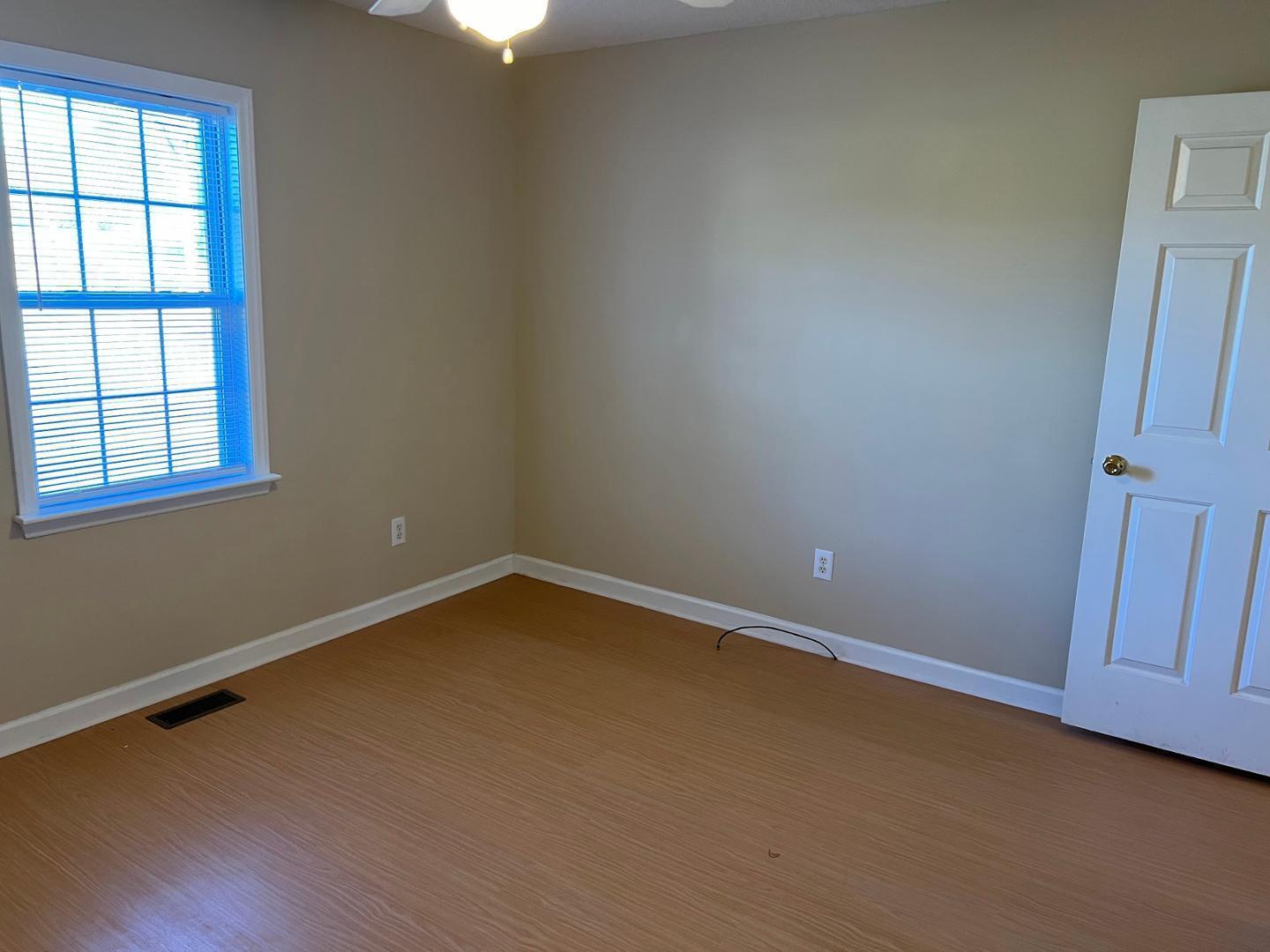 106 Bald Drive Clayton, NC 27520 - Photo 6 of 37 an empty room with a window