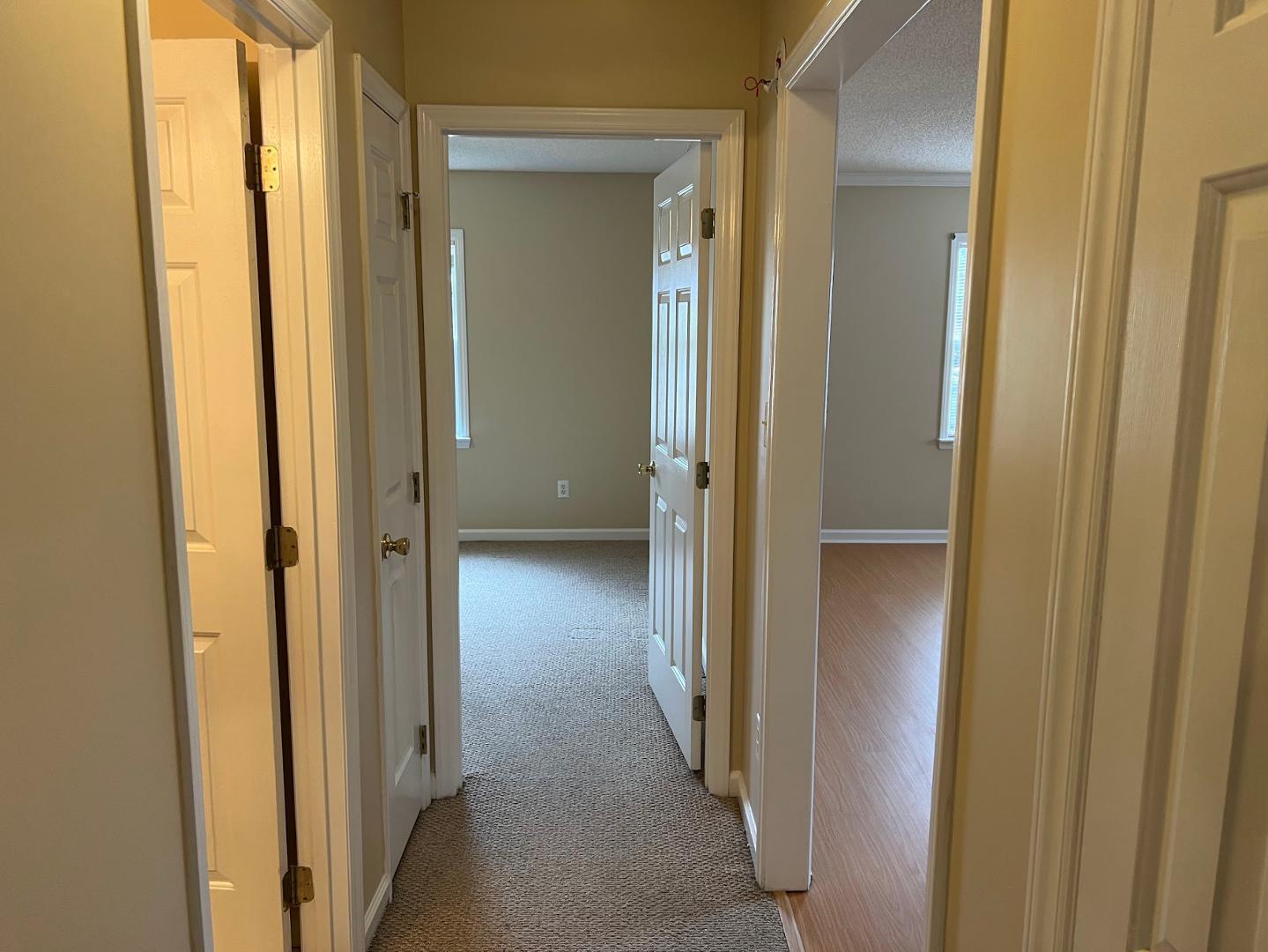 106 Bald Drive Clayton, NC 27520 - Photo 10 of 37 a view of a bathroom from a hallway