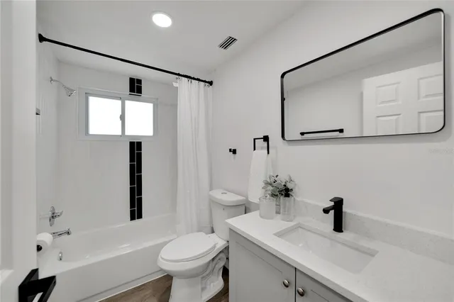 a house with trees in the background