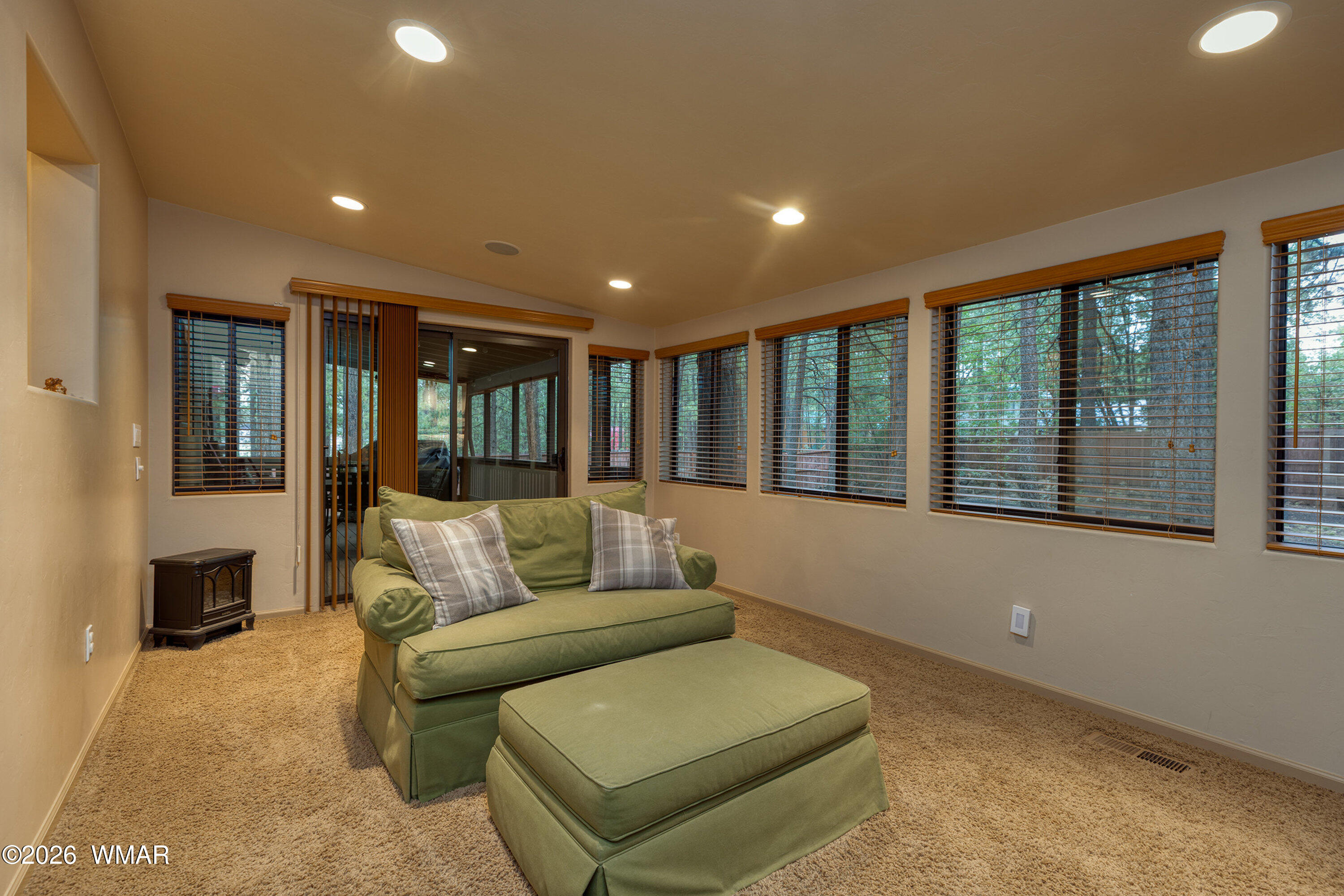 5155 Buck Springs Road Pinetop, AZ 85935 - Photo 18 of 37 a living room with furniture and a large window