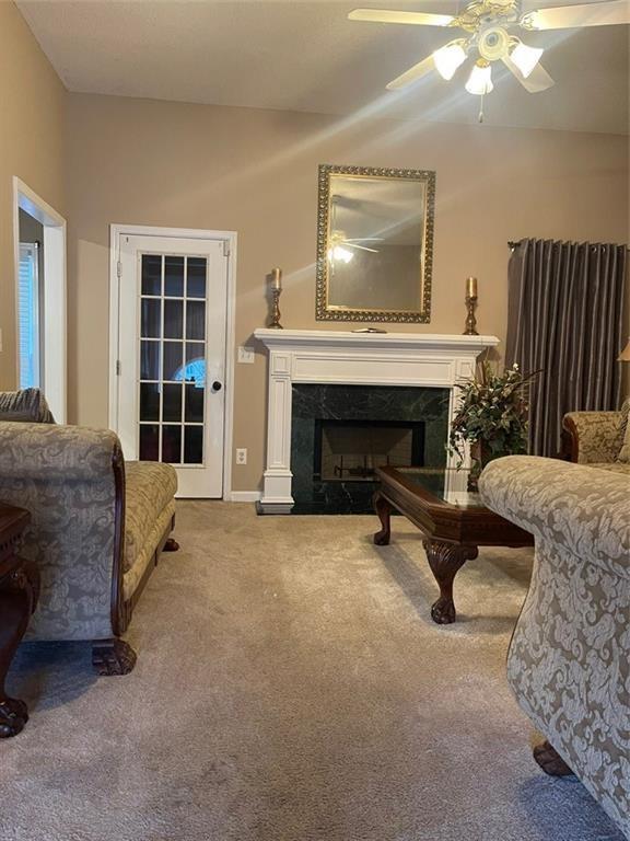 103 Live Oak Court Dallas, GA 30157 - Photo 22 of 25 a living room with furniture and a fireplace