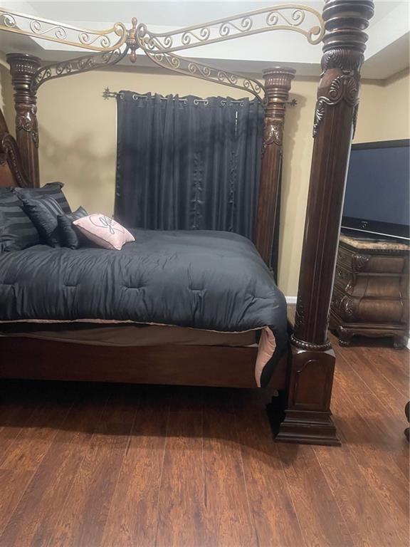 103 Live Oak Court Dallas, GA 30157 - Photo 6 of 25 a bed sitting in a room next to a window