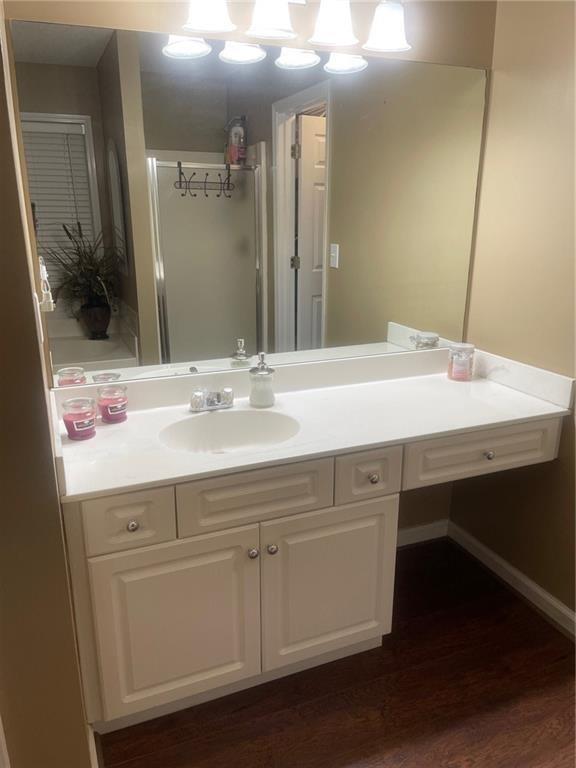 103 Live Oak Court Dallas, GA 30157 - Photo 10 of 25 a bathroom with a sink and a mirror