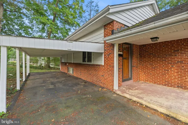 a view of a house with porch and wooden floor