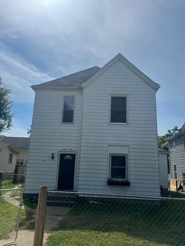 a front view of house with yard