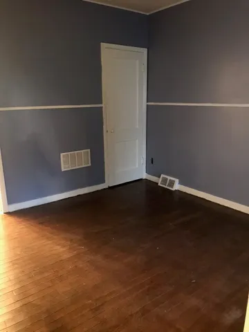 an empty room with a workbench