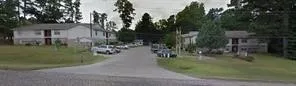 a car parked in front of a house
