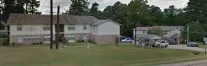 a view of backyard of a house