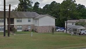 1465 West 6th Rusk, TX 75785 - Photo 7 of 8 a view of a back yard of the house