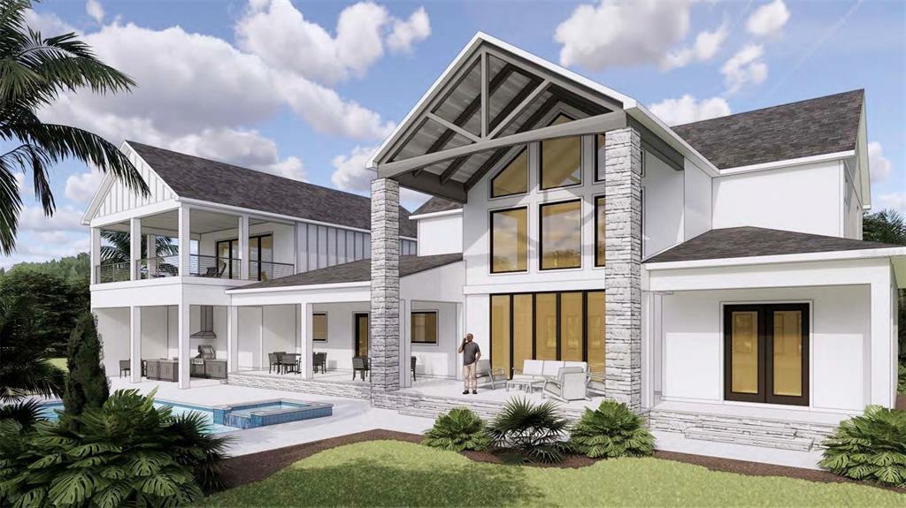 655 Appaloosa Road Tarpon Springs, FL 34688 - Photo 8 of 12 a front view of a house with garden