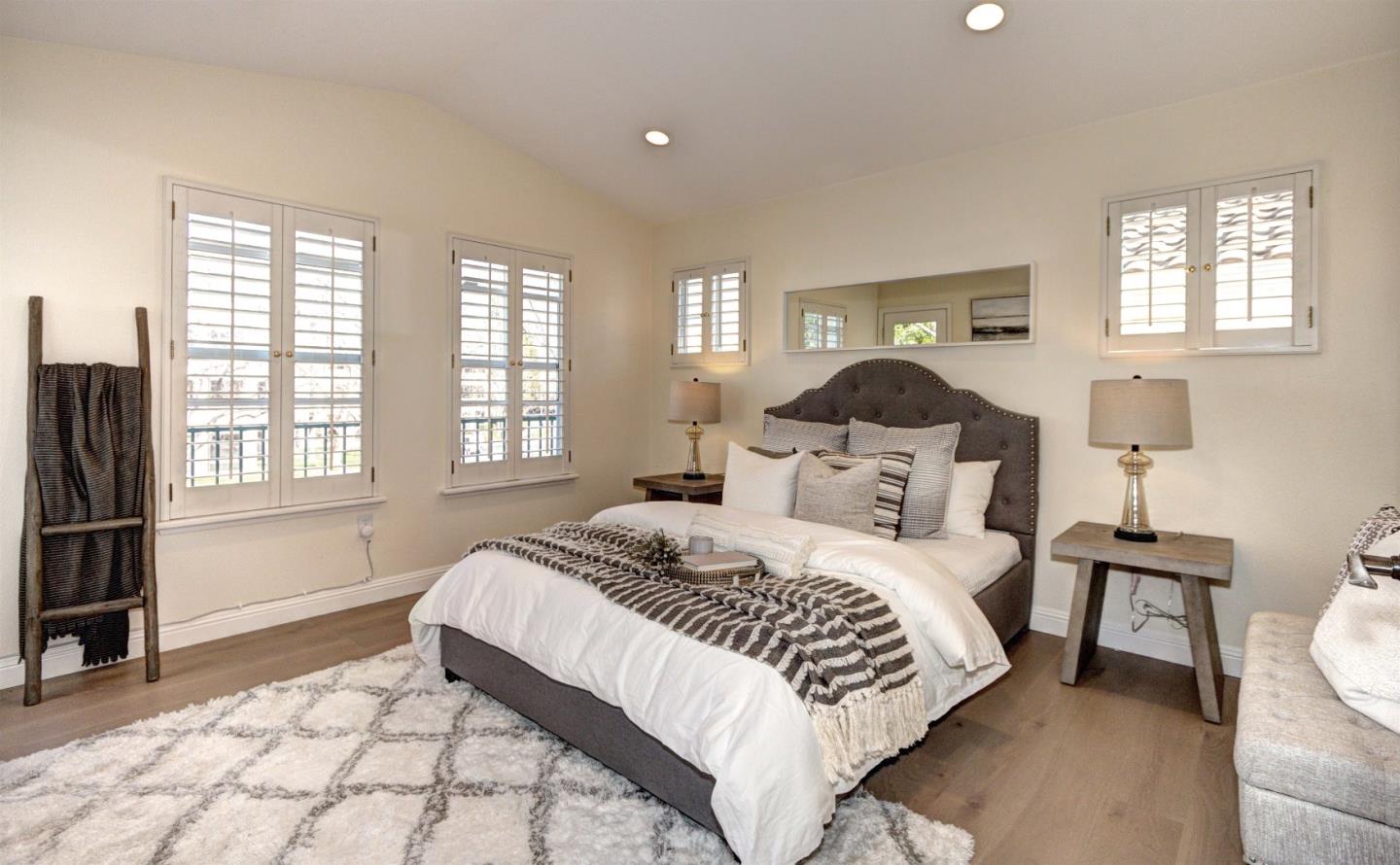 10197 Macadam Lane Cupertino, CA 95014 - Photo 12 of 28 a bedroom with a bed and a window