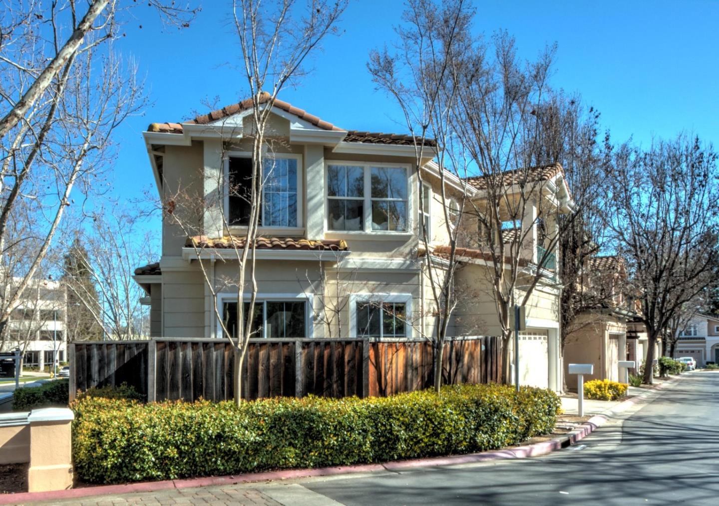 10197 Macadam Lane Cupertino, CA 95014 - Photo 25 of 28 a front view of house with a garden