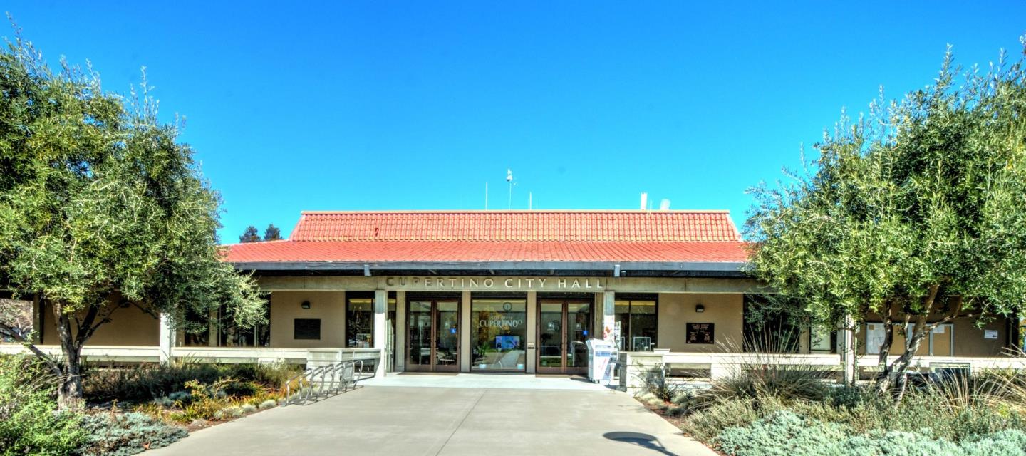 10197 Macadam Lane Cupertino, CA 95014 - Photo 27 of 28 front view of a building with a garden