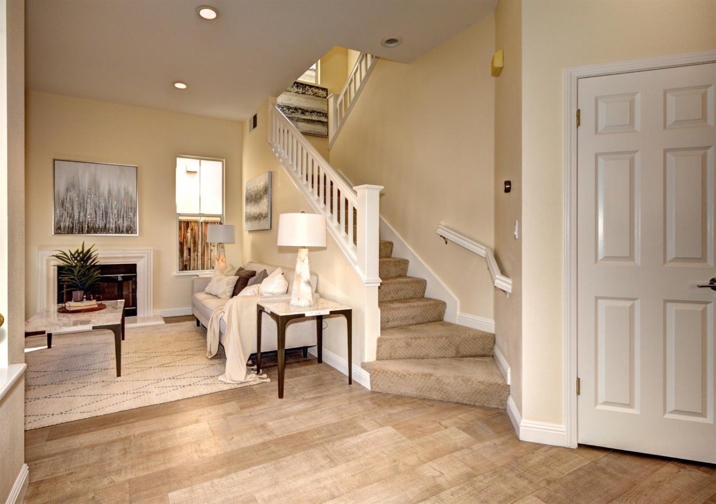 10197 Macadam Lane Cupertino, CA 95014 - Photo 5 of 28 a view of entryway livingroom and hall with wooden floor