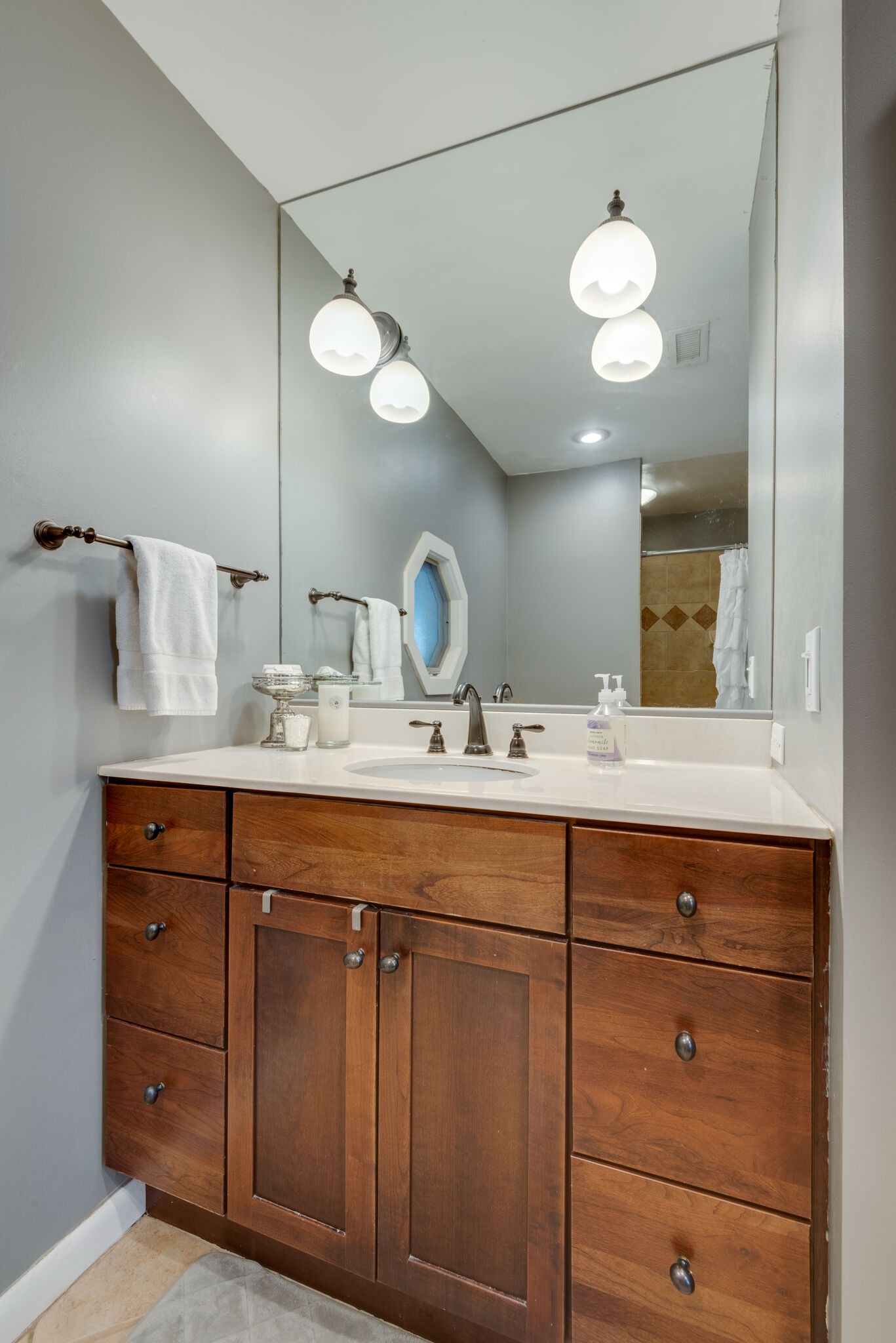 4902 Timberhill Drive Nashville, TN 37211 - Photo 21 of 30 a bathroom with a double vanity sink and a mirror