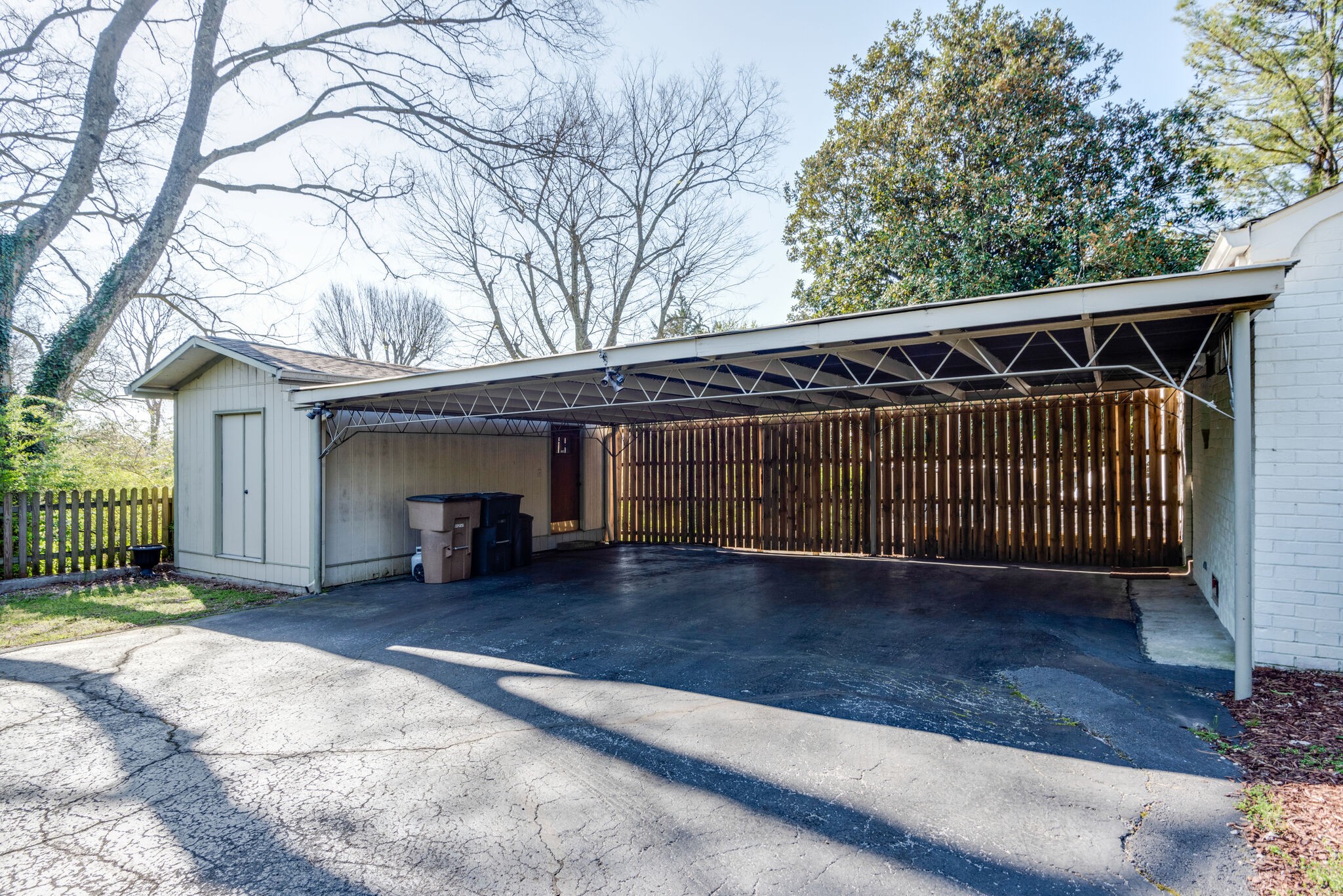 4902 Timberhill Drive Nashville, TN 37211 - Photo 25 of 30 a view of backyard with large trees and wooden fence