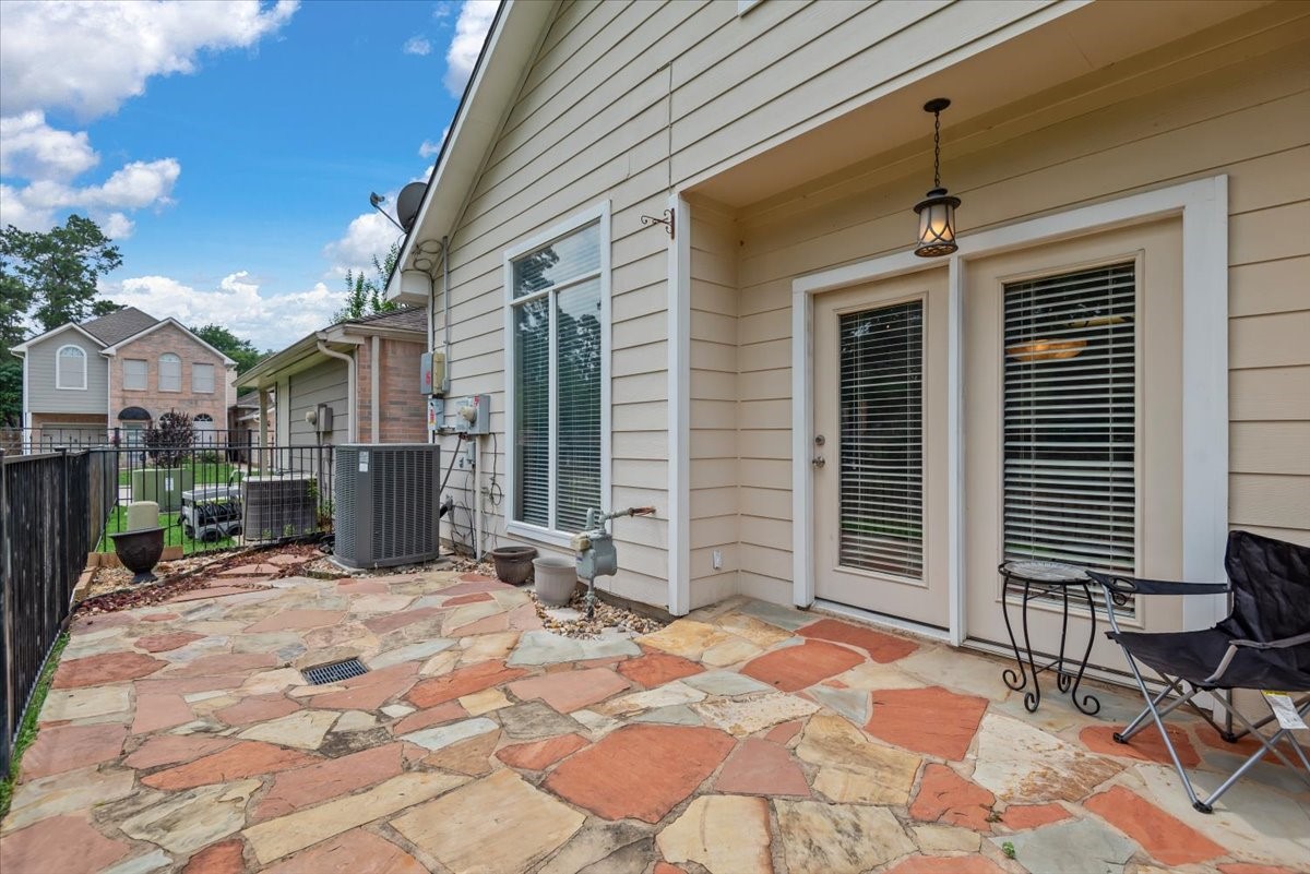 2919 Crescent Star Road Spring, TX 77388 - Photo 30 of 39 The back patio is ready for a morning coffee or a relaxing evening.