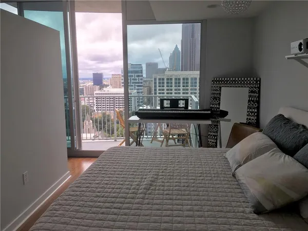 a bathroom with a sink toilet and mirror