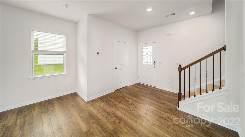 356 Gaines Road Clover, SC 29710 - Photo 44 of 48 wooden floor in an empty room with a window