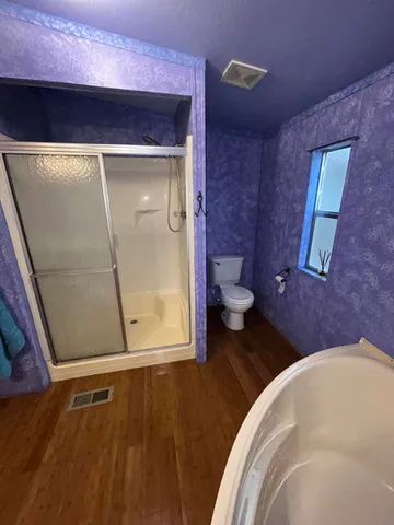 a view of bathroom with a toilet