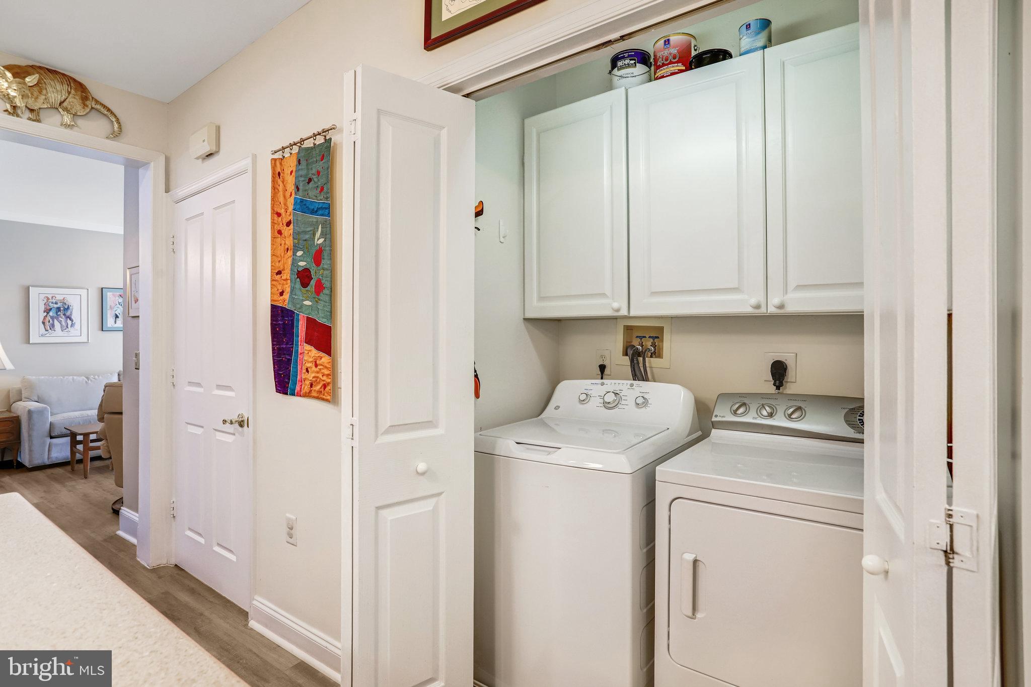 2500 Waterside Drive, Unit 303 Frederick, MD 21701 - Photo 17 of 47 a utility room with dryer and washer