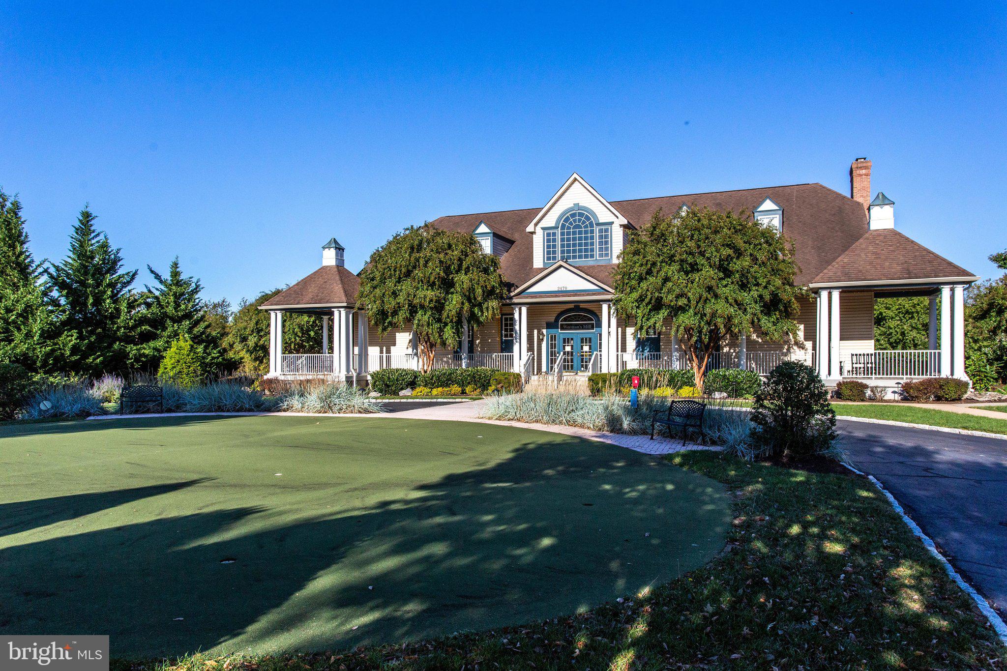 2500 Waterside Drive, Unit 303 Frederick, MD 21701 - Photo 36 of 47 a front view of a house with a yard