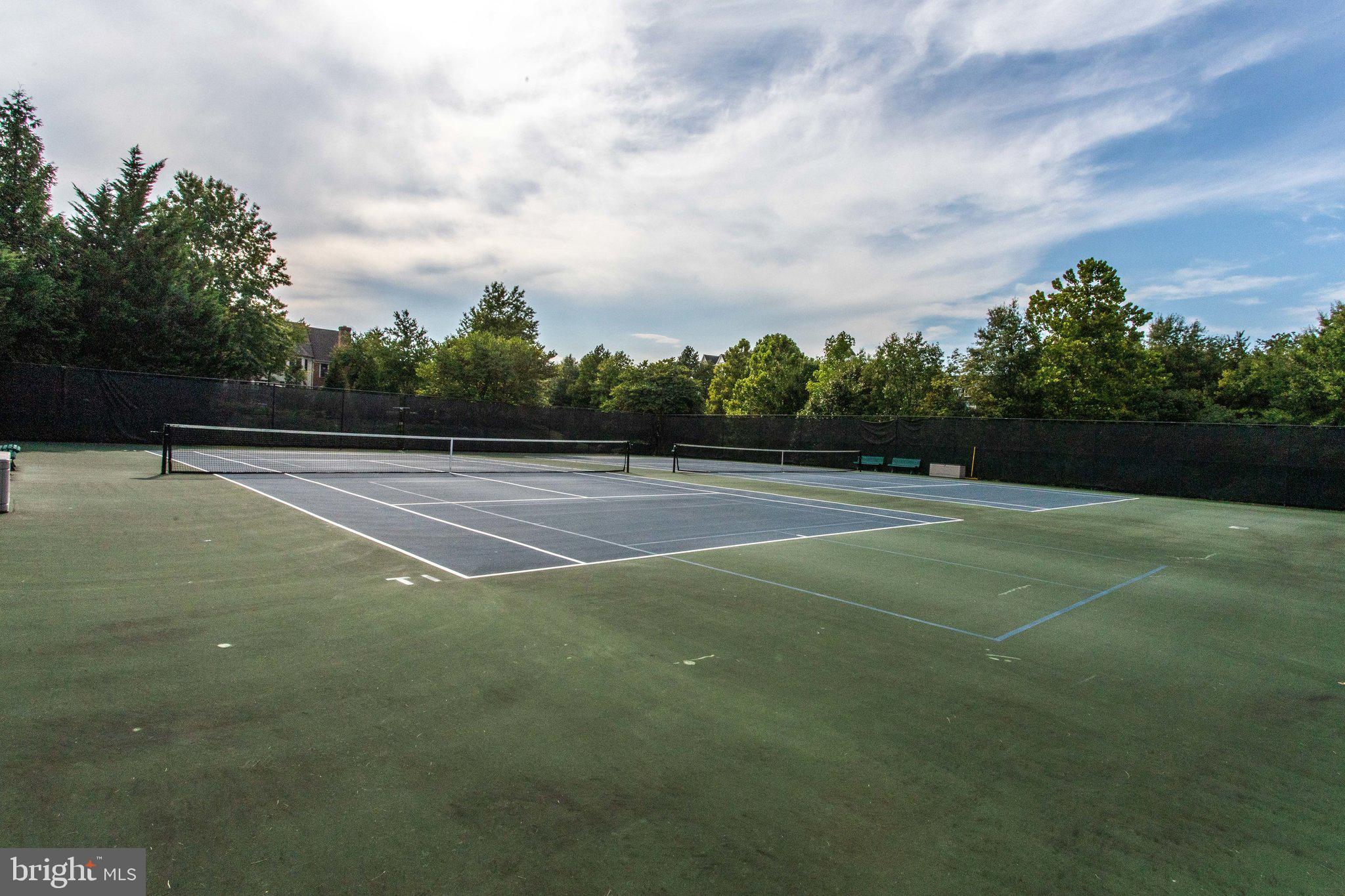 2500 Waterside Drive, Unit 303 Frederick, MD 21701 - Photo 39 of 47 a view of an outdoor space and tennis court