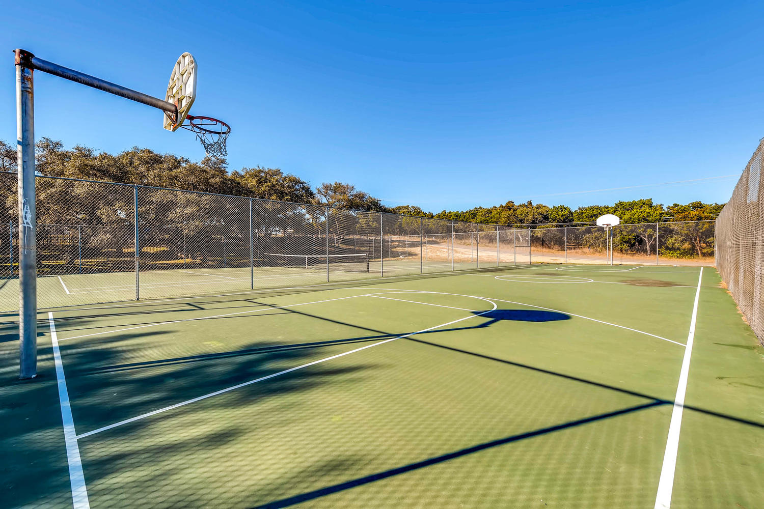 2312 Little Beaver Trail Austin, TX 78734 - Photo 13 of 17 a view of a tennis court