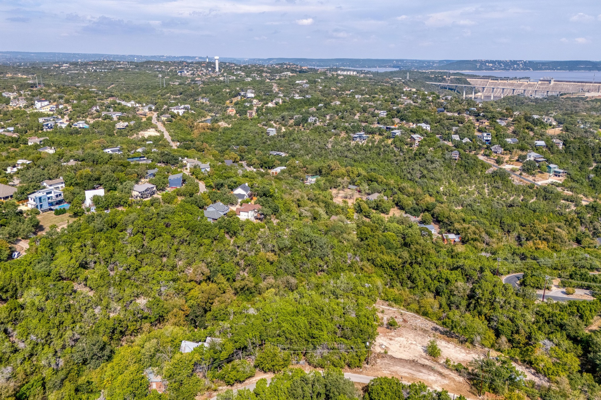 2312 Little Beaver Trail Austin, TX 78734 - Photo 6 of 17 an aerial view of residential houses with outdoor space and trees