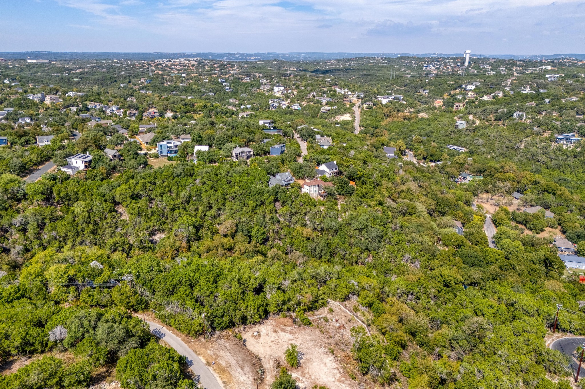 2312 Little Beaver Trail Austin, TX 78734 - Photo 8 of 17 an aerial view of residential houses with outdoor space and trees