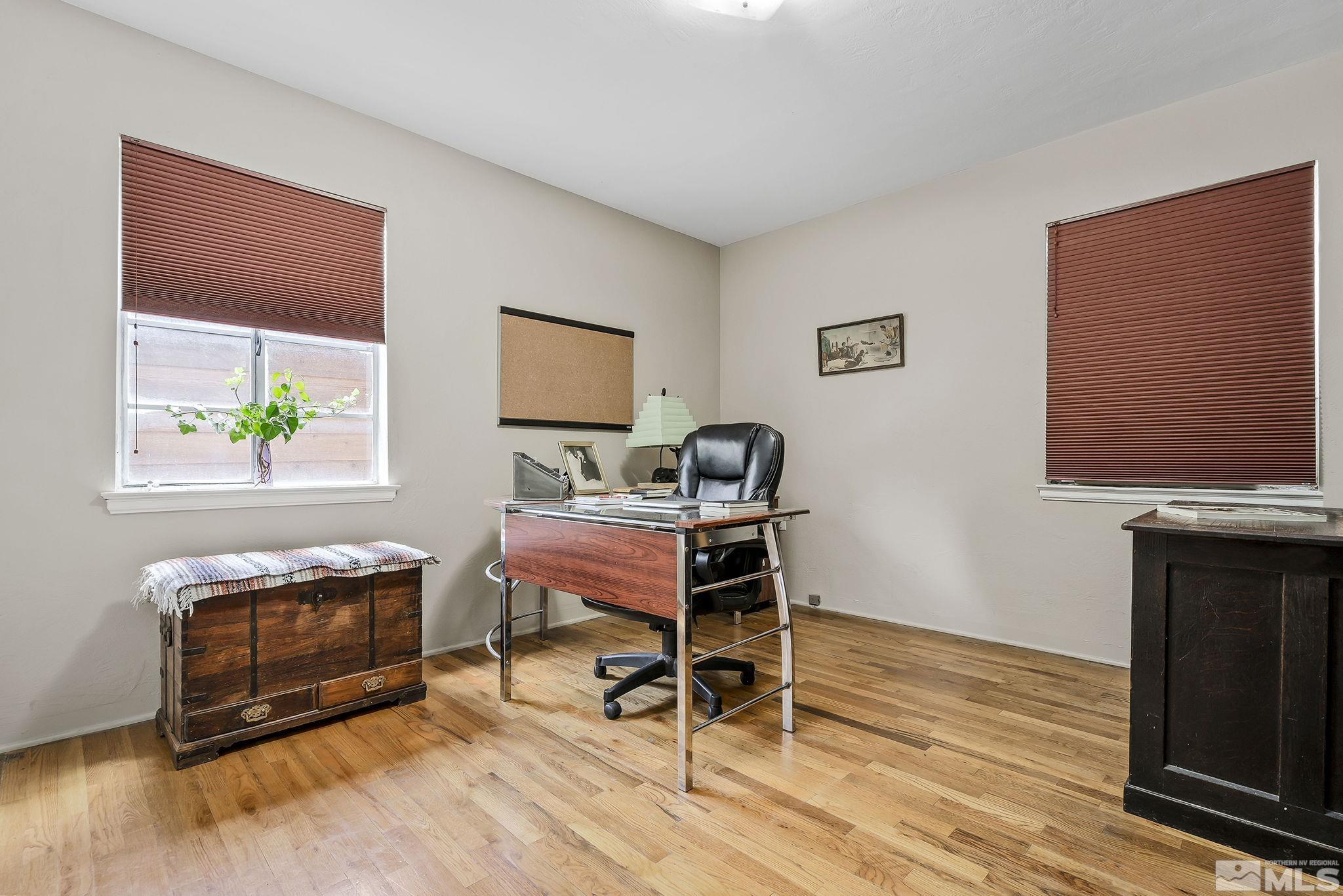 620 Cardinal Way Reno, NV 89509 - Photo 11 of 18 a room with furniture and a fireplace