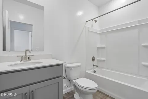a bathroom with a sink a toilet and a bathtub