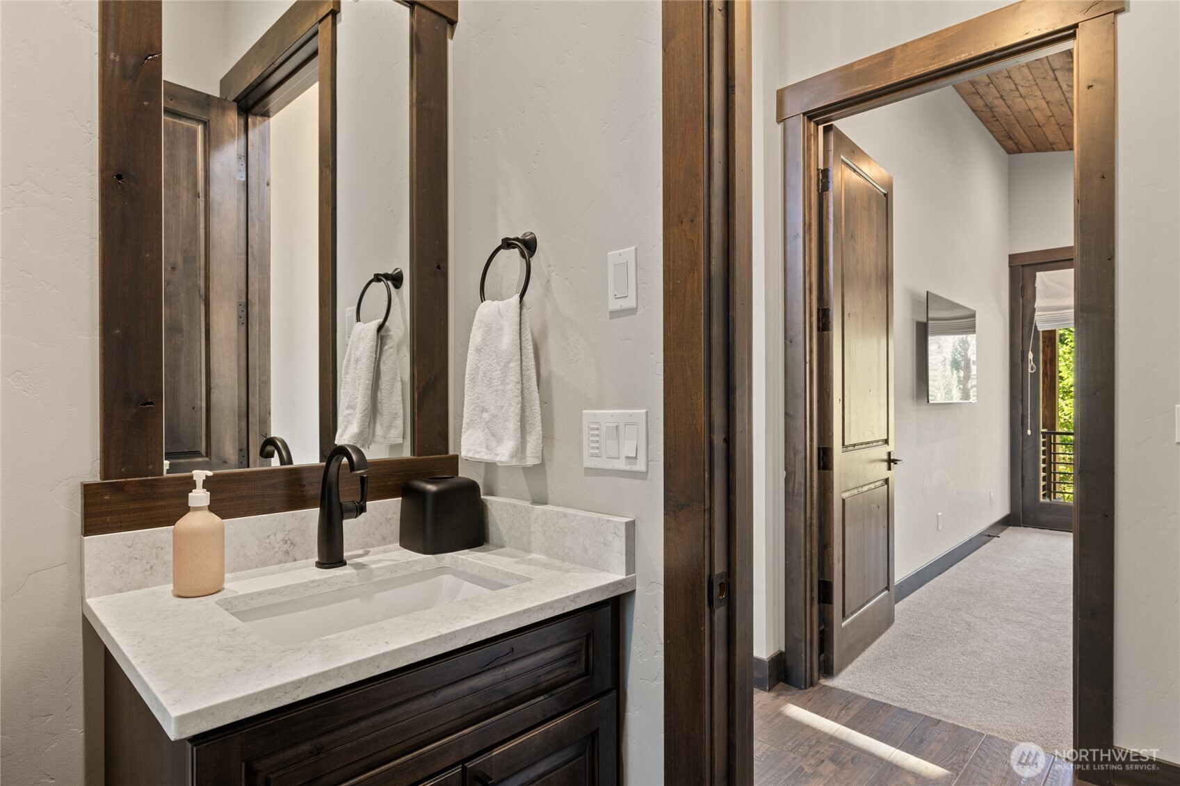 890 Larkspur Loop Cle Elum, WA 98922 - Photo 17 of 40 a kitchen with a sink and a mirror