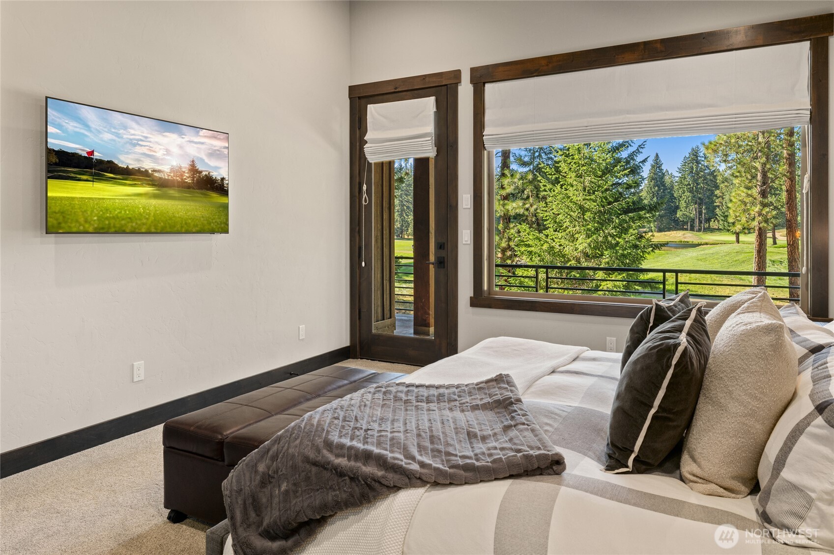 890 Larkspur Loop Cle Elum, WA 98922 - Photo 19 of 40 a bed sitting in a bedroom next to a window