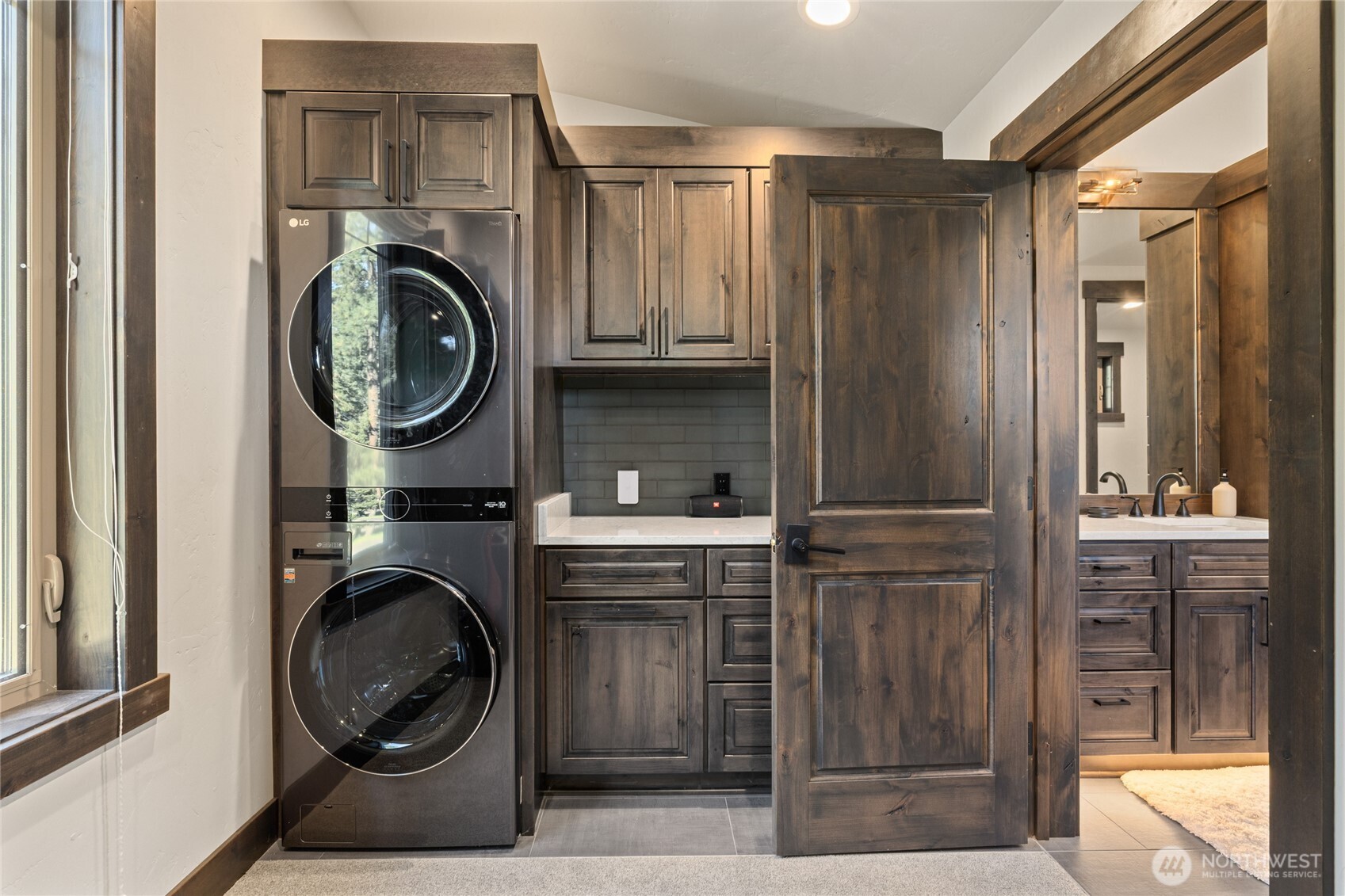 890 Larkspur Loop Cle Elum, WA 98922 - Photo 24 of 40 a view of a storage and utility room with washer and dryer