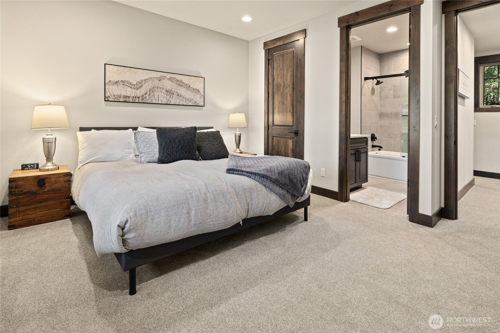 890 Larkspur Loop Cle Elum, WA 98922 - Photo 30 of 40 a bedroom with a bed and a painting on the wall