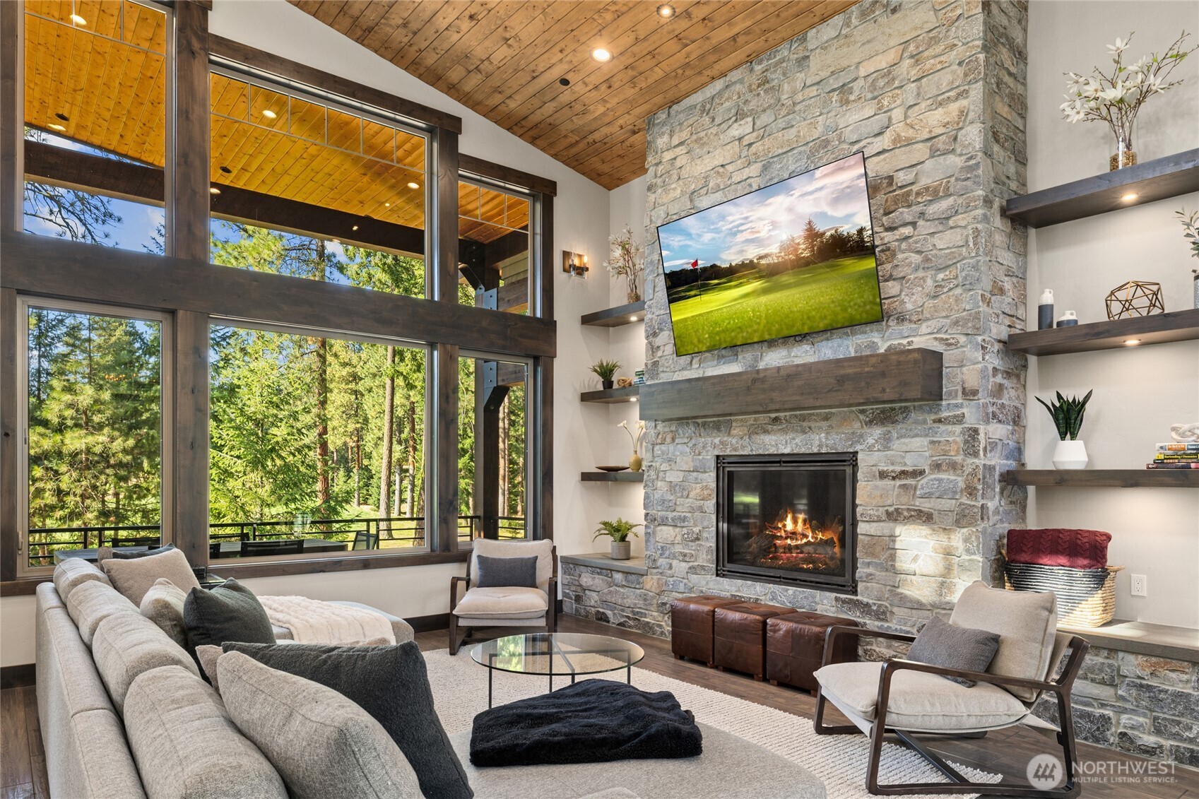 890 Larkspur Loop Cle Elum, WA 98922 - Photo 6 of 40 a living room with furniture a fireplace and a flat screen tv