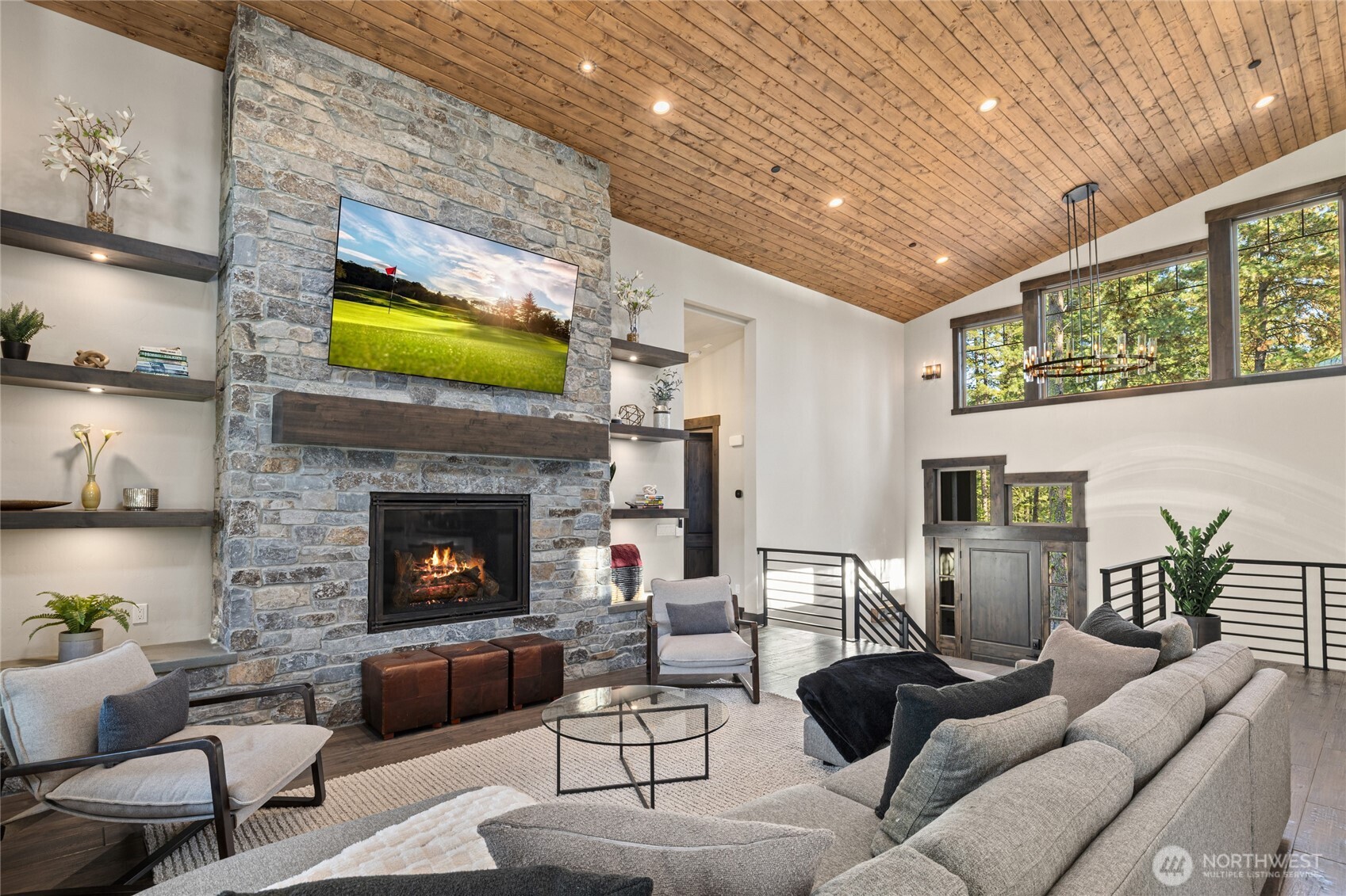 890 Larkspur Loop Cle Elum, WA 98922 - Photo 7 of 40 a living room with furniture a fireplace and a flat screen tv